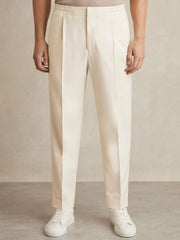 Reiss | Relaxed-Fit Pleated Tapered Trousers in Ecru