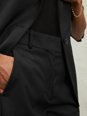 Reiss | Wool-Blend Tailored Flared Suit Trousers in Black