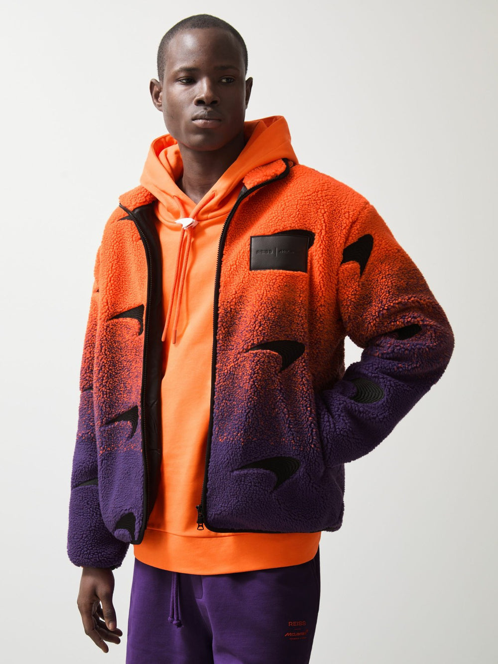 Reiss | Unisex Fit McLaren F1 Team Ombré Fleece Jacket in Papaya Orange/Purple