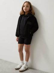 Reiss | 13-14 yrs Unisex Fit McLaren F1 Team Embroidered Fleece Jacket in Black