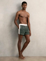 Reiss | Colour-Block Piped-Trim Swim Shorts in Dark Green/White