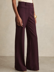 Reiss | Petite High Rise Flared Trousers in Burgundy