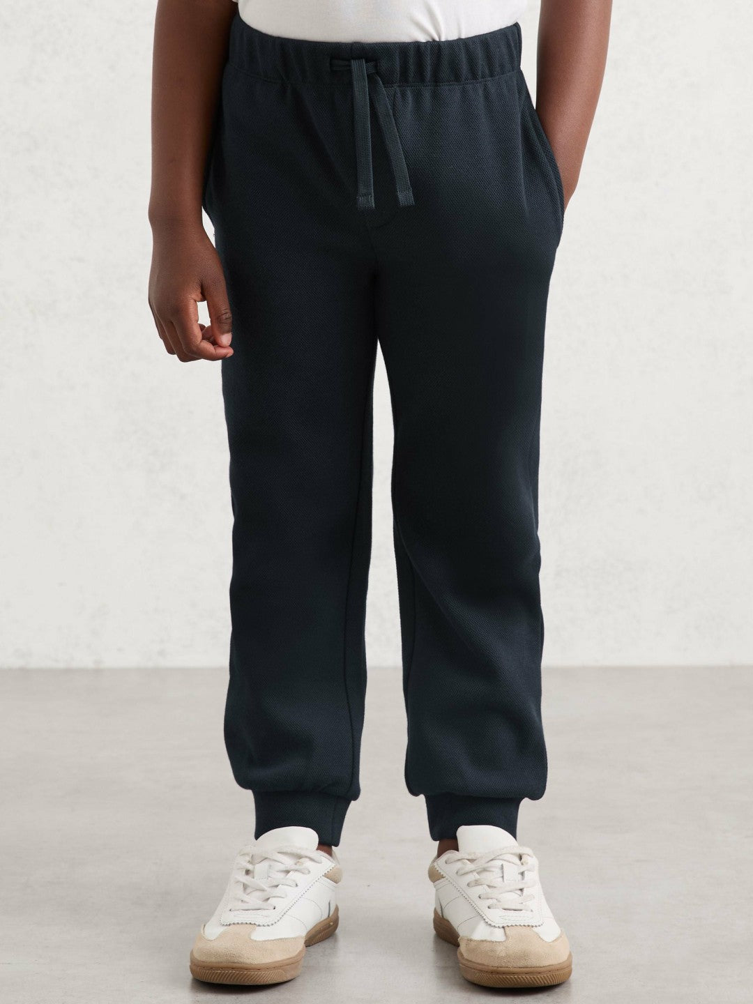 Reiss | Cotton-Blend Textured Cuffed Joggers in Navy