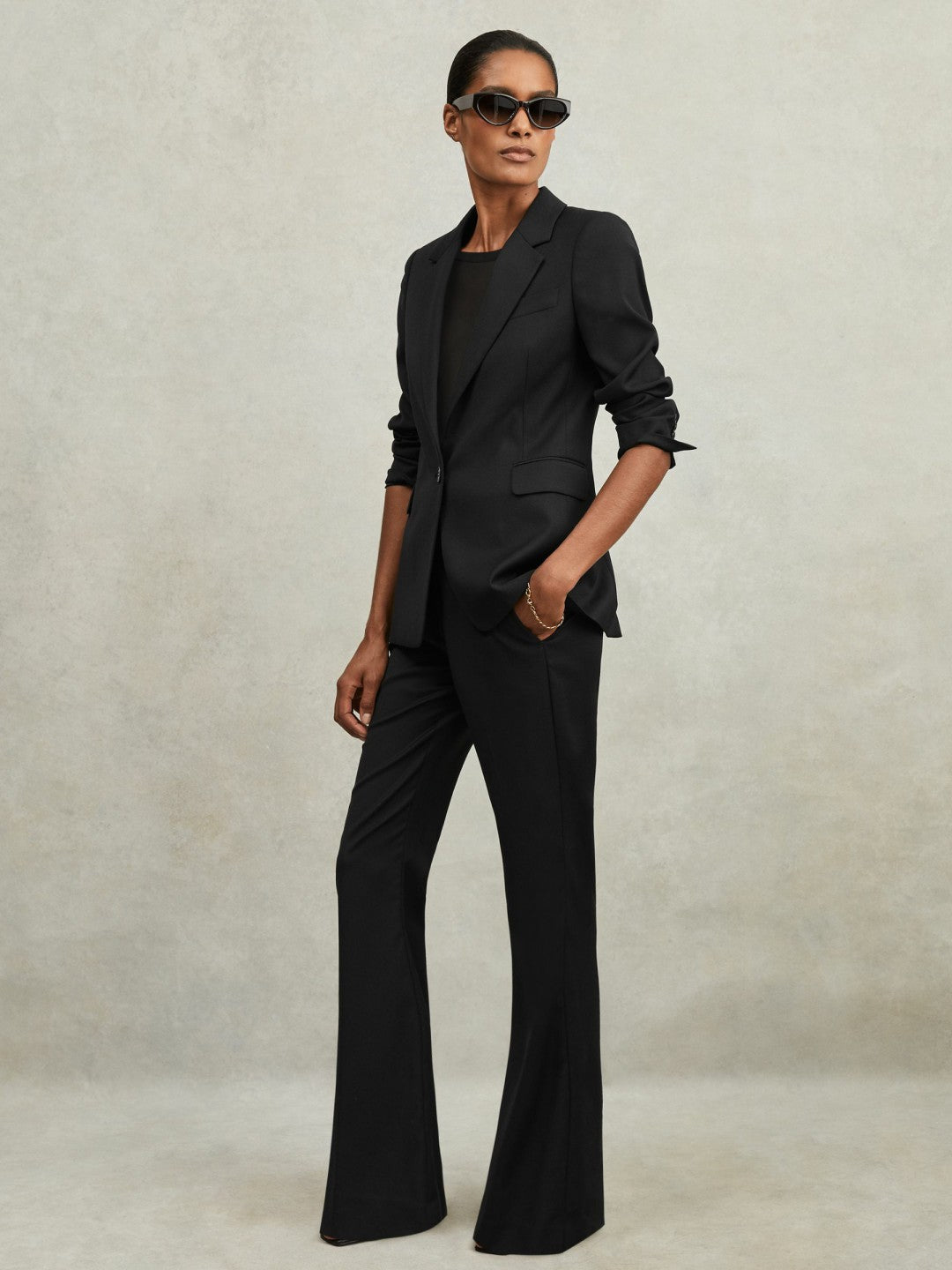 Reiss | Wool-Blend Tailored Flared Suit Trousers in Black