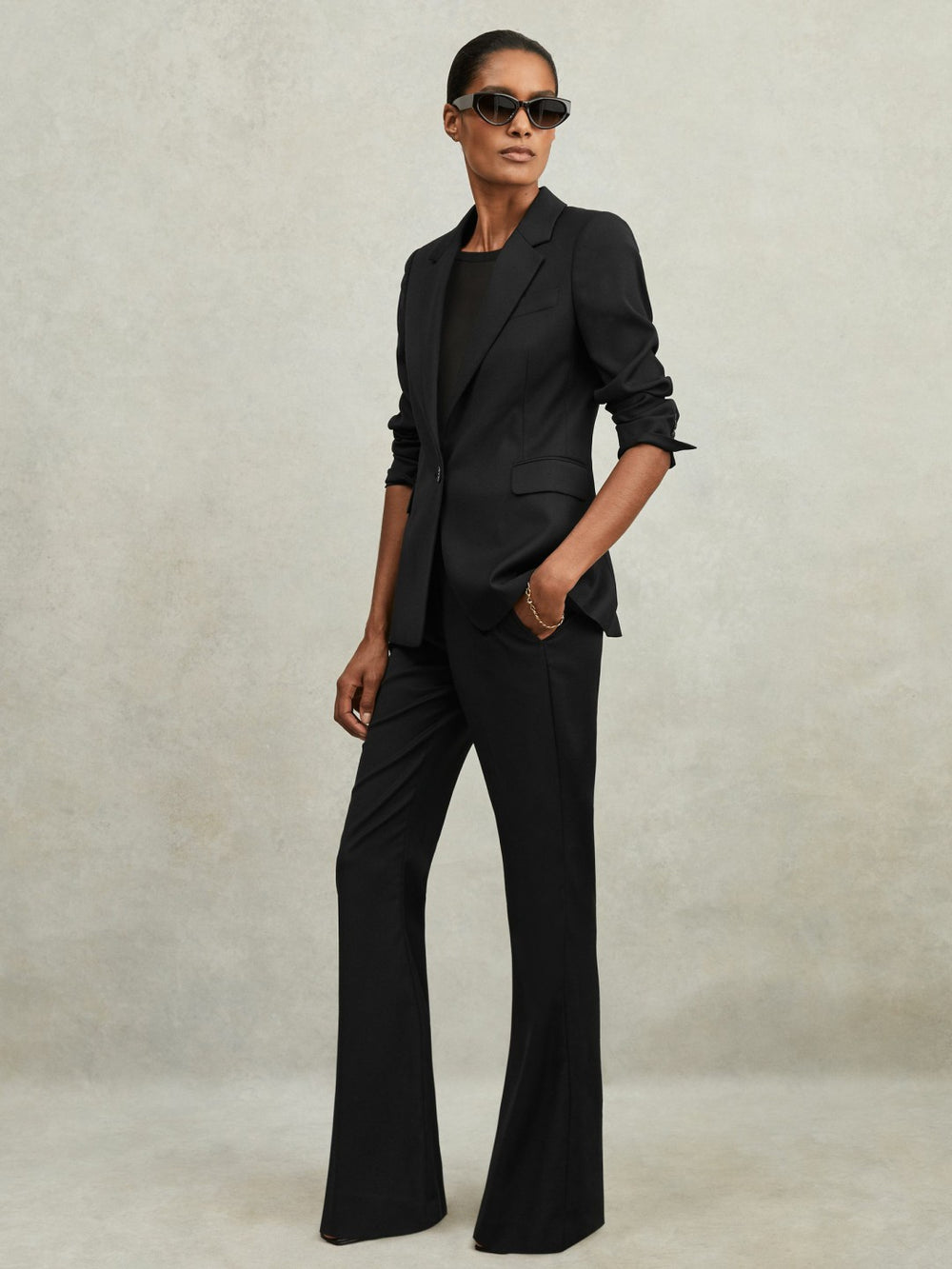 Reiss | Wool-Blend Tailored Flared Suit Trousers in Black