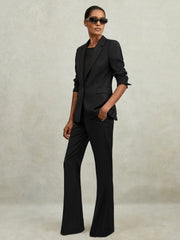 Reiss | Wool-Blend Tailored Flared Suit Trousers in Black
