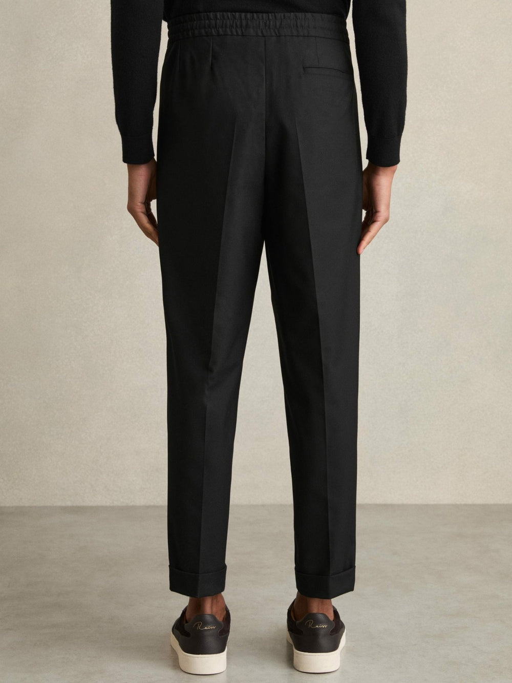 Reiss | Relaxed-Fit Pleated Tapered Trousers in Black