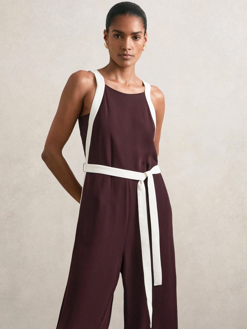 Reiss | Colourblock Wide Leg Belted Jumpsuit in Burgundy/Cream
